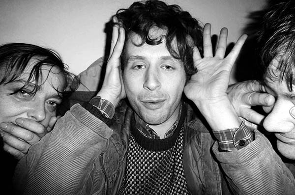 Three people doing 3 wise monkeys