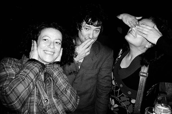 Three people doing 3 wise monkeys