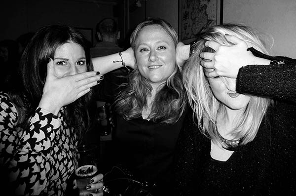 Three people doing 3 wise monkeys