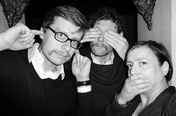 Three people doing 3 wise monkeys