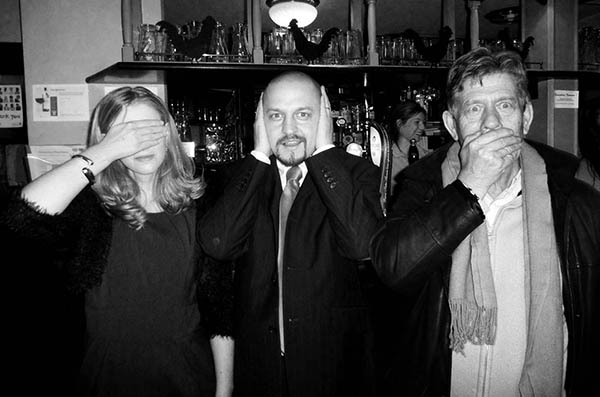 Three people doing 3 wise monkeys