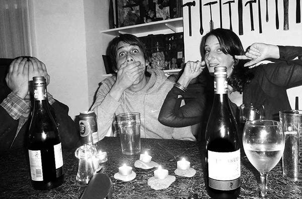 Three people doing 3 wise monkeys