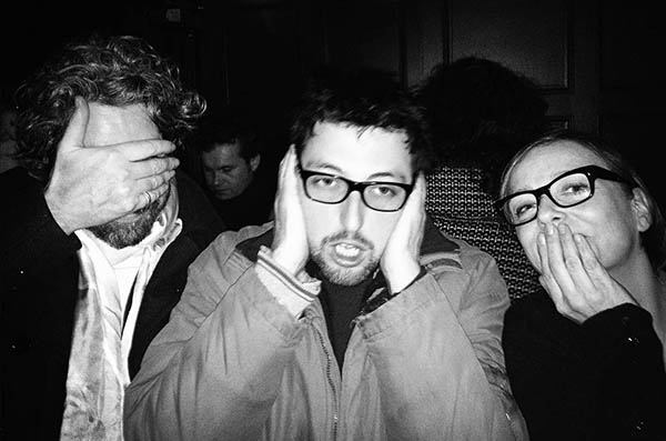 Three people doing 3 wise monkeys