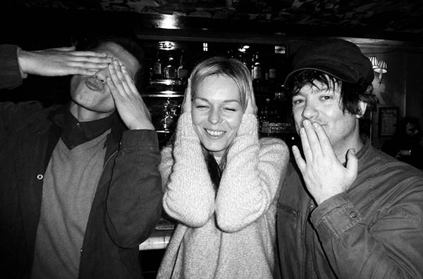 Three people doing 3 wise monkeys