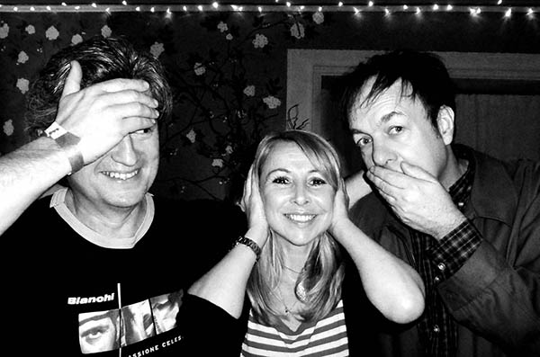 Three people doing 3 wise monkeys