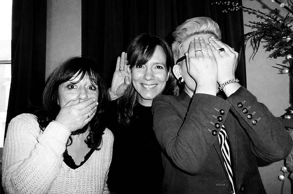 Three people doing 3 wise monkeys