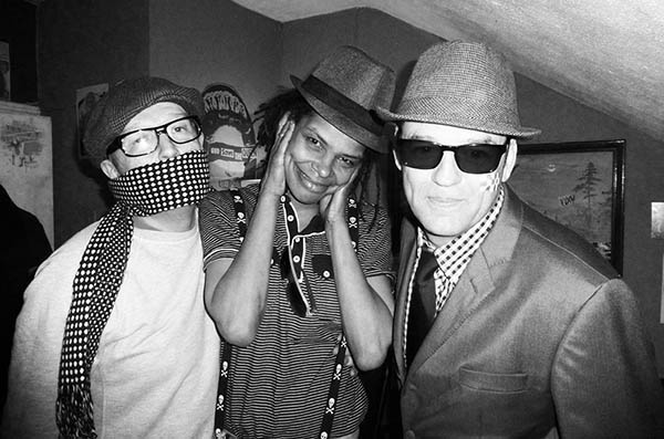 Three people in fancy dress doing 3 Wise Monkeys