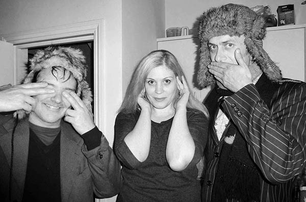 Three people doing 3 Wise Monkeys