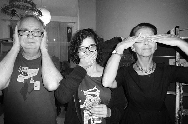 Three people doing 3 Wise Monkeys