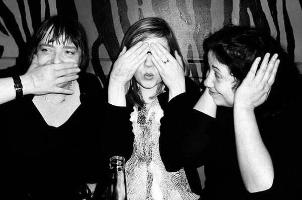 Three people doing 3 Wise Monkeys