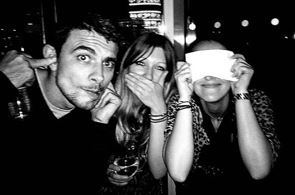 Three people doing 3 Wise Monkeys