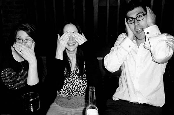 Three people doing 3 Wise Monkeys