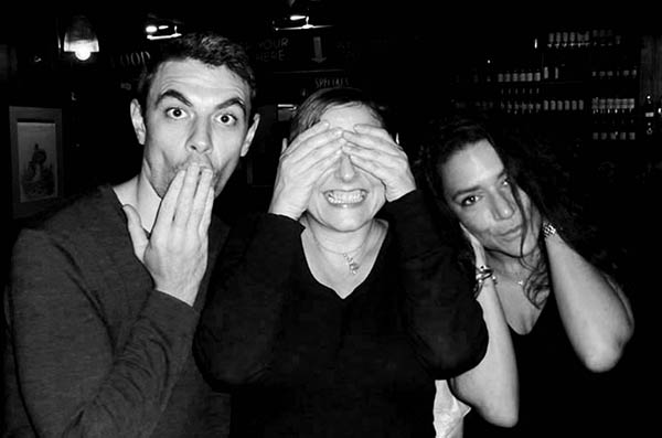 Three people doing 3 Wise Monkeys