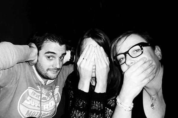 Three people doing 3 Wise Monkeys