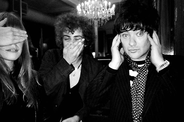 Three people doing 3 Wise Monkeys