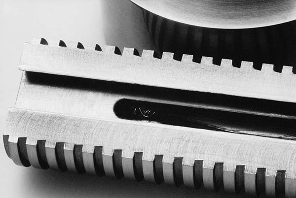 Steel container containing lock of hair