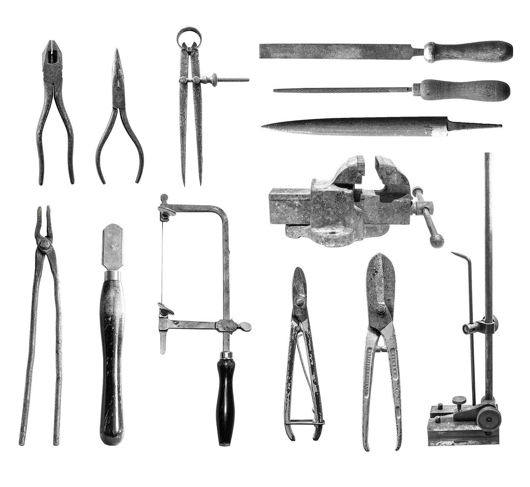 Silver Speaks Form Exhibition wall vinyl - photos of silversmithing tools used to construct (plyers, dividers, files, piercing saw, cutters, height gauge)