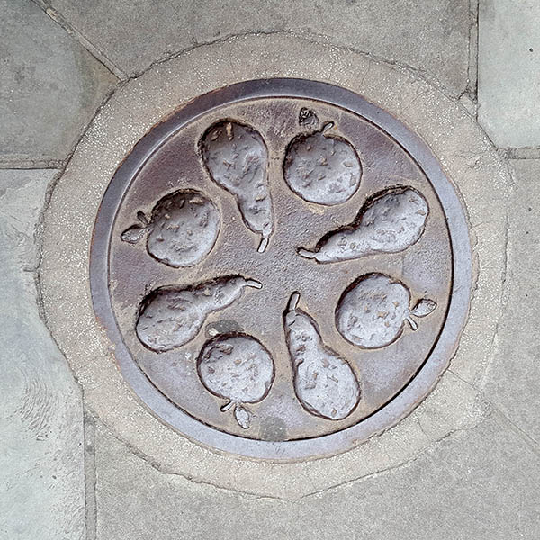 Manhole Cover, London - Cast iron with raised apples and pears