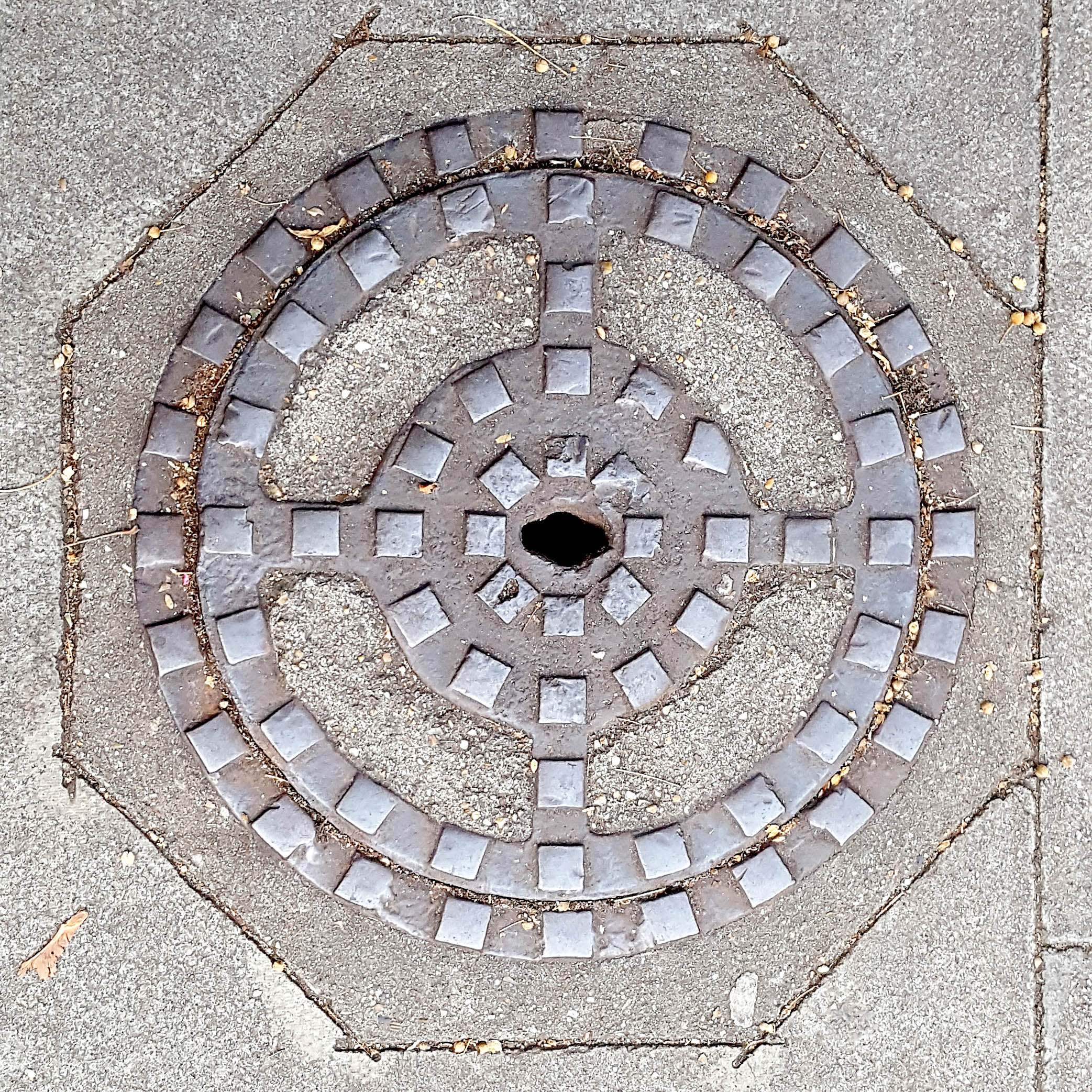 Manhole Cover, London - Cast iron with raised squares and concrete sections