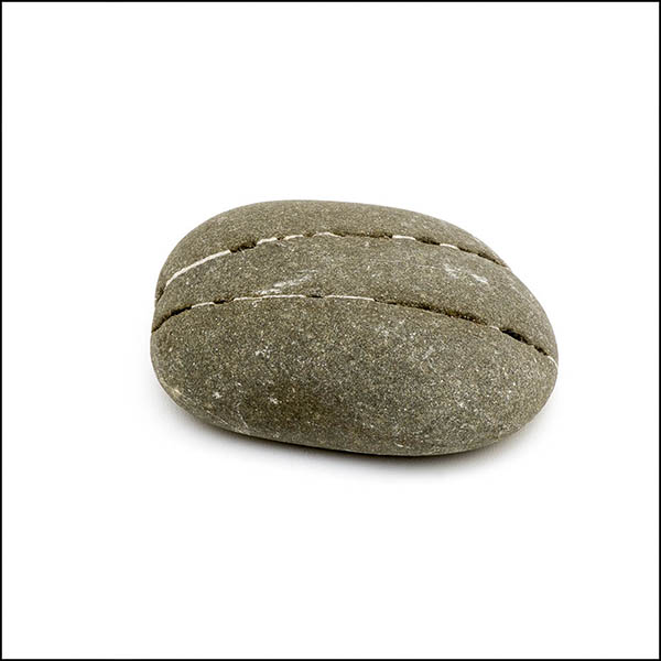 Pebble - oval, warm grey, two eroded horizontal lines