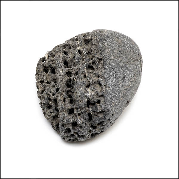 Pebble - oval, cool grey, pitted eroded