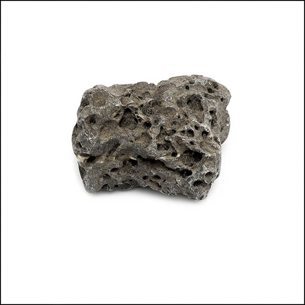 Pebble - uneven shape, warm grey, pitted eroded