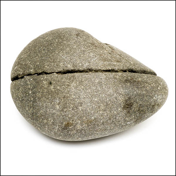 Pebble - pear shaped, warm grey, one central eroded horizontal line