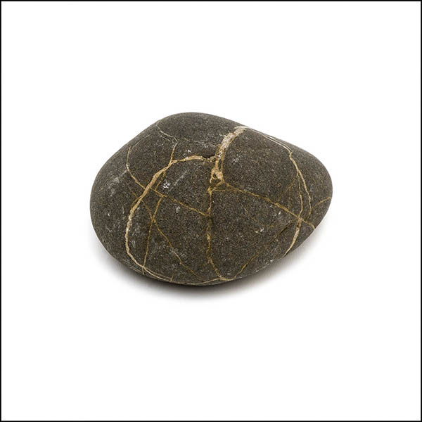 Pebble - uneven shape, warm grey, multiple thin criss cross stripes